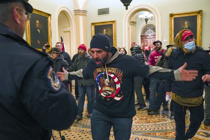 Doug Jensen of Des Moines during the Jan. 6 insurrection on the US Capitol Building. Perpetrators were fueled by rightwing extremism.