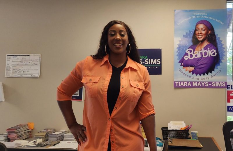 Tiara Mays-Sims, a smiling Black woman, in her campaign office