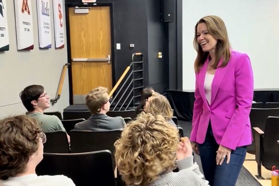 Democratic congressional candidate Christina Bohannan speaks with students at the University of Iowa's Iowa Memorial Union.