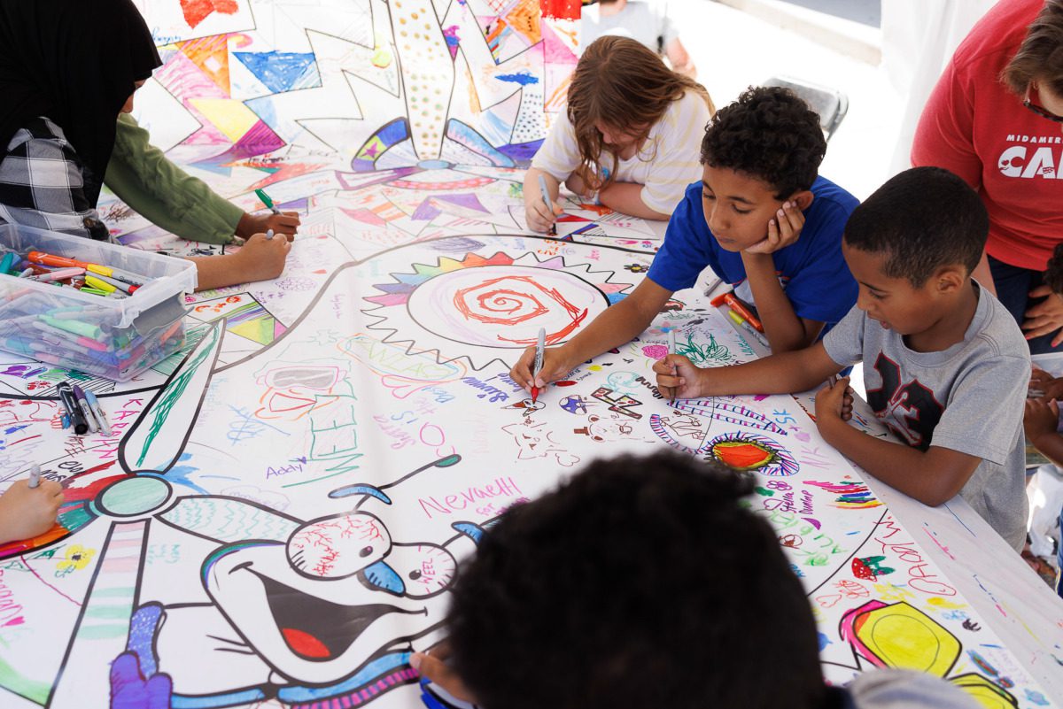 Hinterland festival attendees watching a performance.