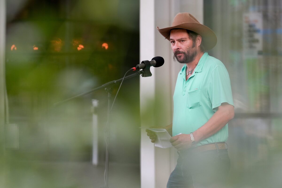 Johnson County Supervisor Jon Green speaks during a Free Speech Rally Oct. 1, 2025 on the Pedestrian Mall in downtown Iowa City, Iowa.